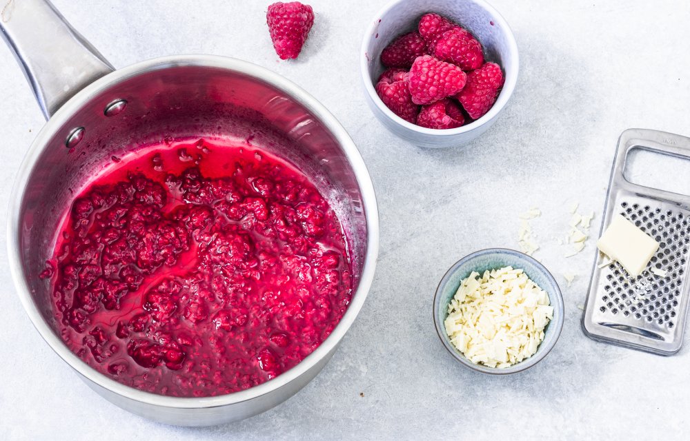 Cheesecake met frambozen in een glaasje