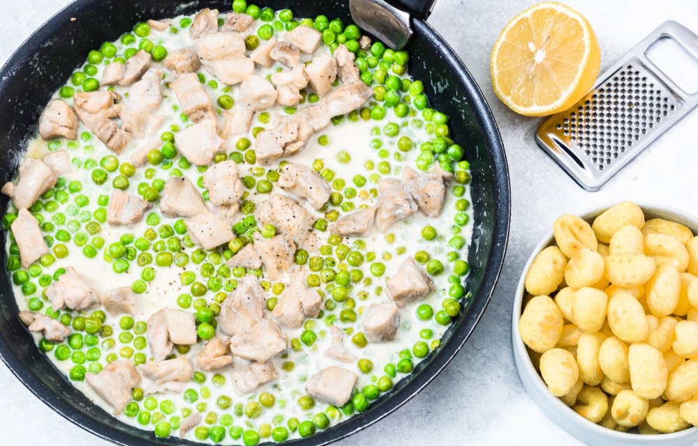 romige gnocchi met doperwten